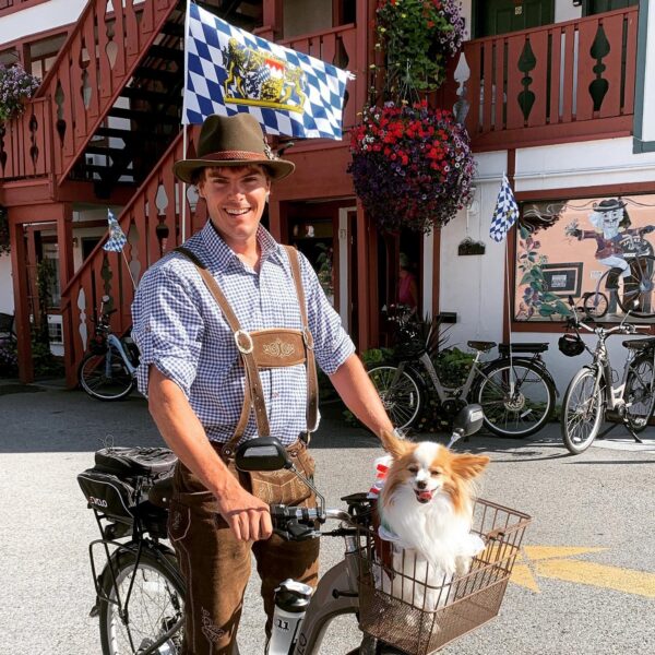 leavenworth scene with e-bike rider and dog